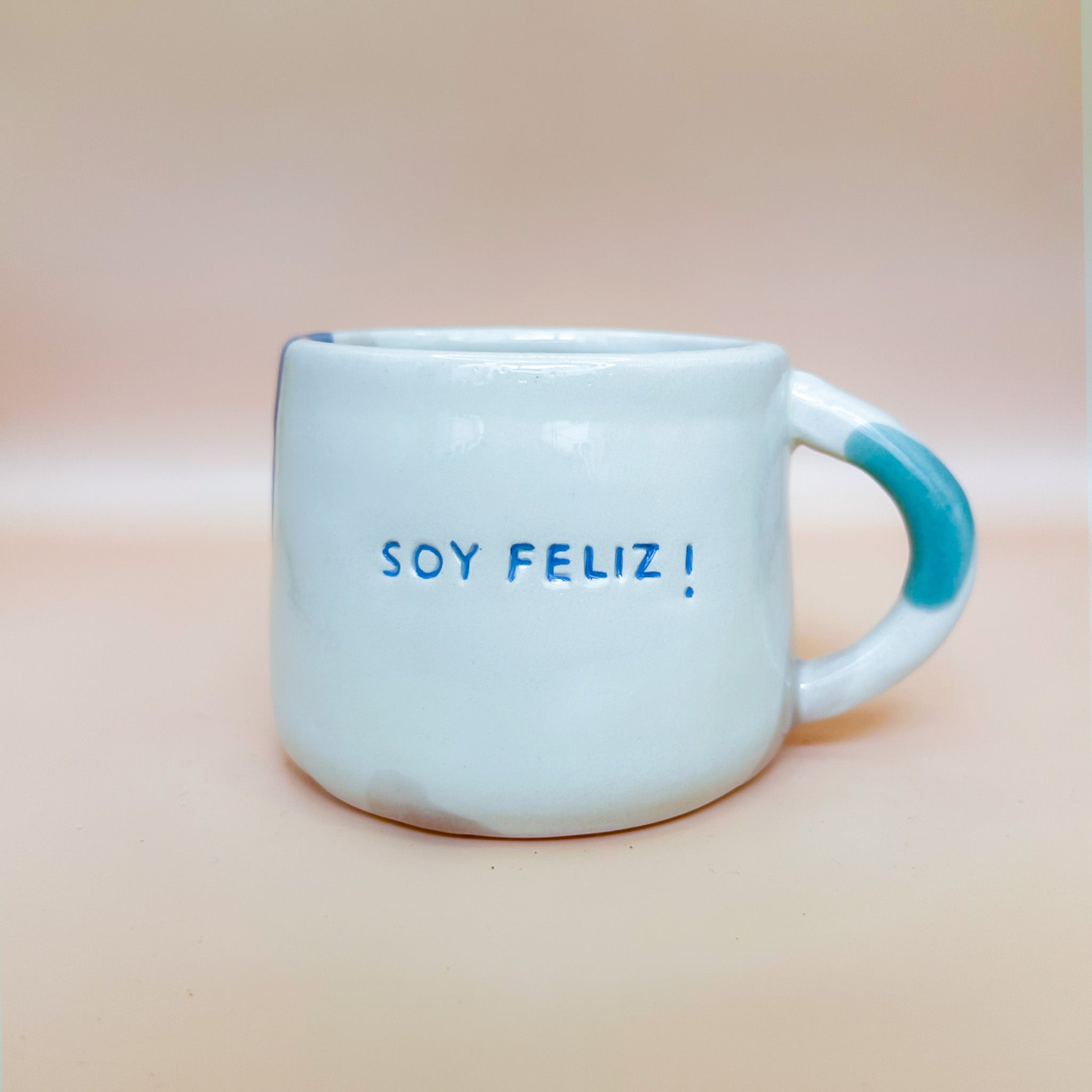 Taza Soy Feliz - ojito y boqui azuli